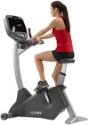 Cybex 770C Upright Fitness Bike (Remanufactured) - Angled View with User